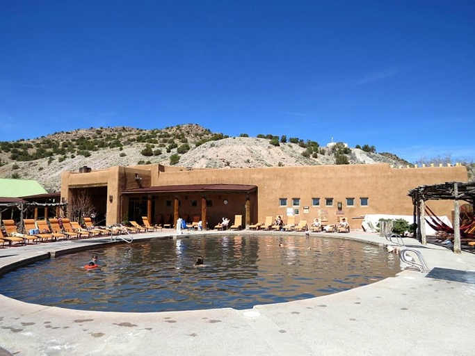 The Ojo Santa Fe Resort in New Mexico is a great place to relax and rejuvenate in one of their many hot spring pools.