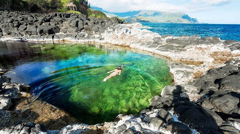 The Queen's Bath Tide Pool is a natural pool located in Princeville, Hawaii.